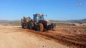 国产农田捡石机视频,国产捡石机工作实况解析